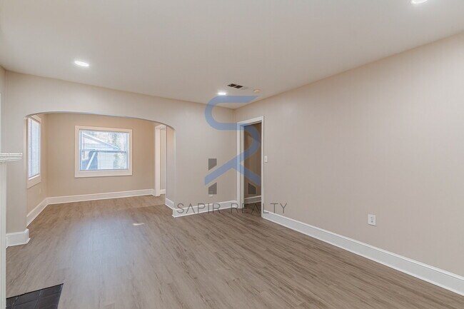 Building Photo - Move in before December 31st and choose your reward: a $250 Amazon Gift Card or a 55" Smart TV!