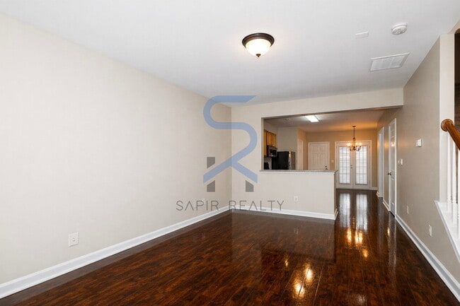 Building Photo - Move in before February 28th and choose your reward: a $250 Amazon Gift Card or a 55" Smart TV!