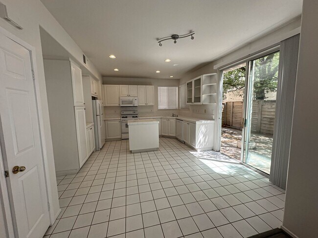 Building Photo - Charming 4-Bedroom Home with a Private Pat...