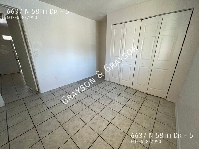 Building Photo - 6637 N 58th Dr