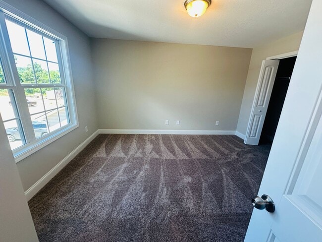 Building Photo - Beautiful Like-New 3 bed/2.5 bath w/ 2-car garage & fenced in backyard available June 24th!