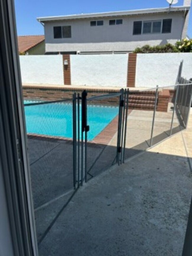 Building Photo - Spacious 4BR Home with Gated Pool, Chef’s Kitchen & 3-Car Garage