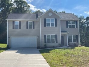 Building Photo - Available Now – Spacious 4BR Home on 1.5 Acres in Rural Hall!