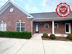 Building Photo - RENT SPECIAL! Freshly Painted! New Carpet!...
