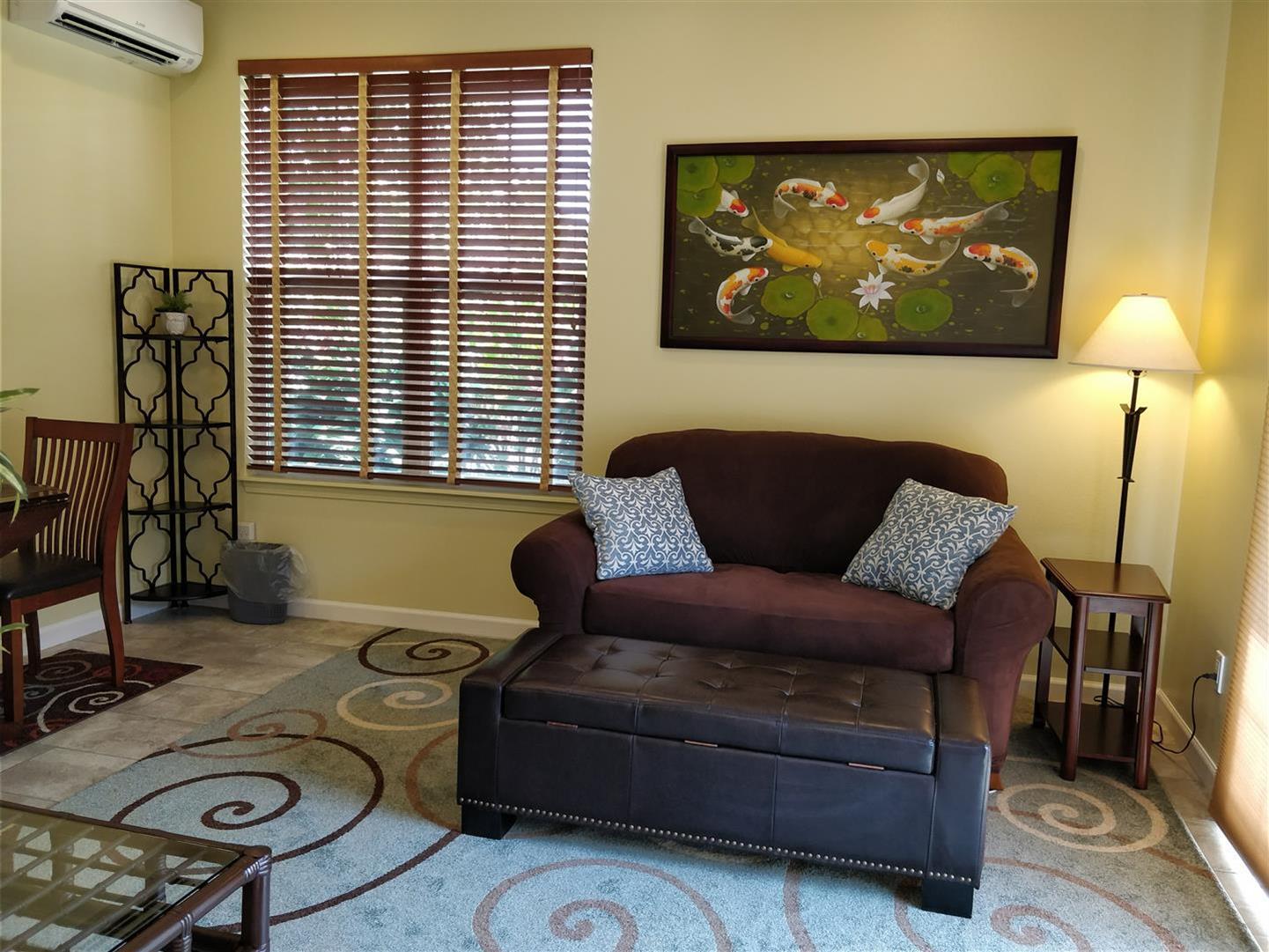 Living room area, not as yellow in real life - 170 Kuli Puu St