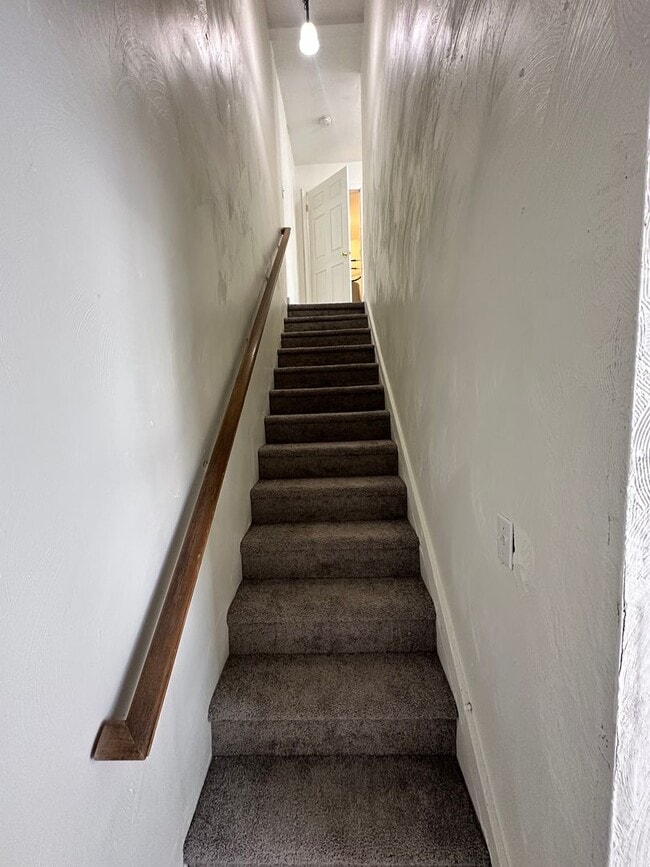 Building Photo - Three Bedroom Available Soon!