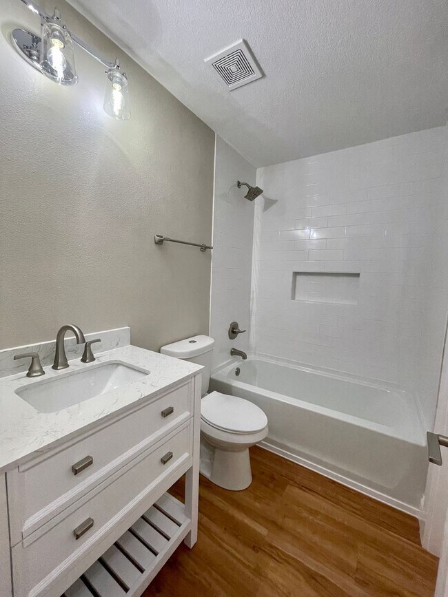 Building Photo - Fully Renovated 2B/2B condo located behind...
