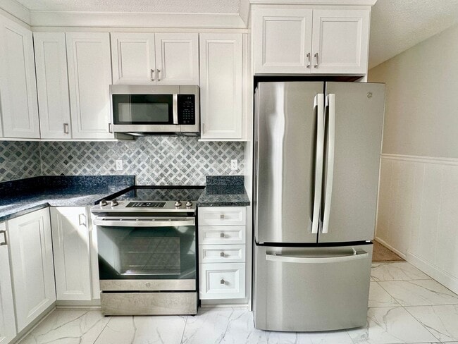 Building Photo - Updated 3BR Ranch | Large Lot, Deck & Modern Finishes – Minutes to Durham