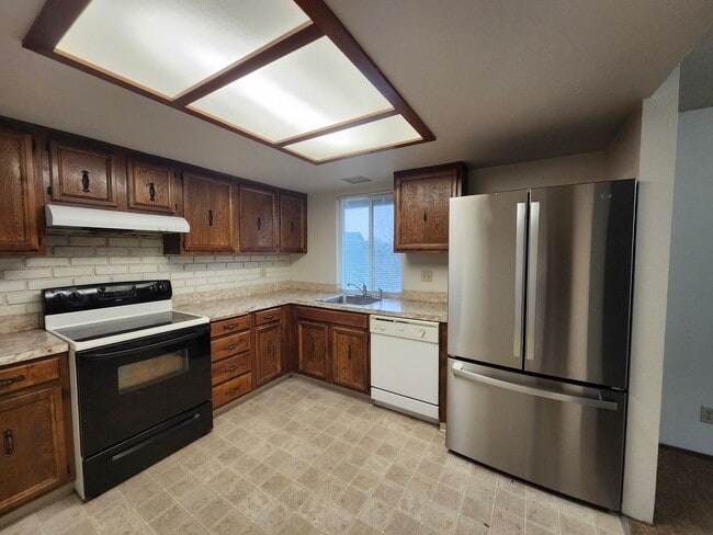 Building Photo - Spacious One Level 4 Bedroom, All New Kitchen Appliances, Landscaping Included!