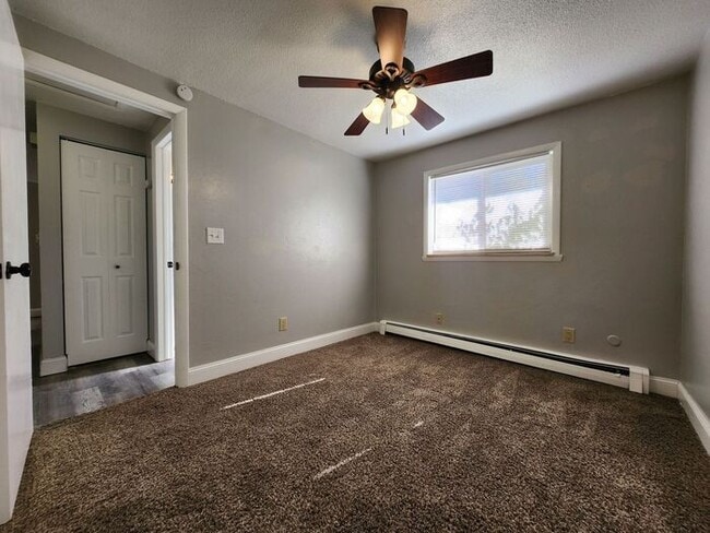 Building Photo - Cozy 2-Bed, 1-Bath Apartment – Upper Level with Covered Outdoor Space!