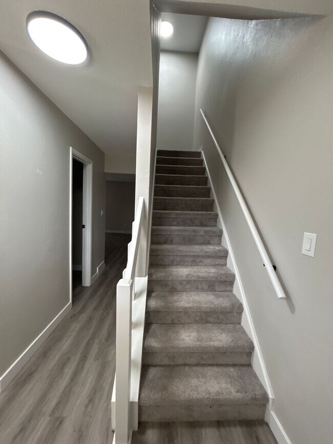 Building Photo - Beautifully Redone 3-Bedroom, 1.5-Bathroom Condo with Attached Garage – $1,725/Month (Lawn Care &...
