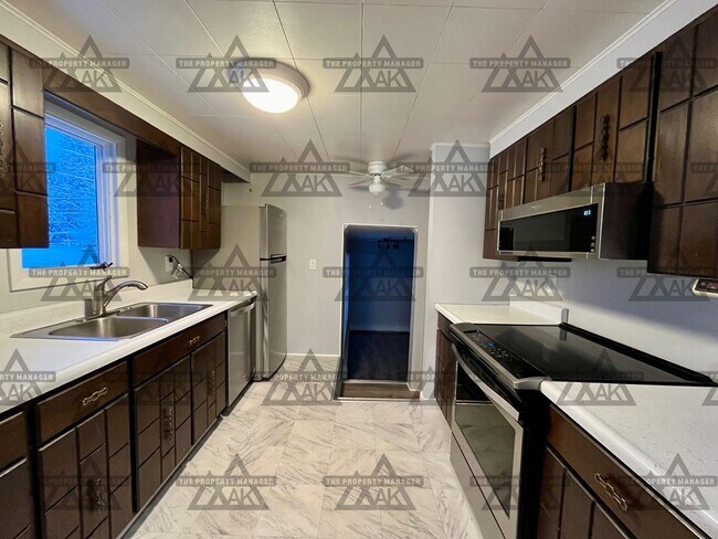 Building Photo - Dog-Friendly Tri-Level Home on Double Lot with Fenced Yard