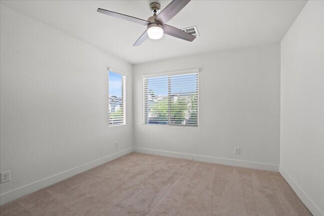 Building Photo - Modern Gated 3 Bedroom Retreat with Loft & Entertainer’s Backyard