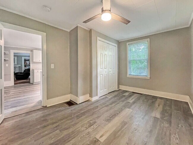 Building Photo - Seeking a roommate for a 2 bdr, 2 bath lower level condo with a porch and private yard, 1.5 miles...