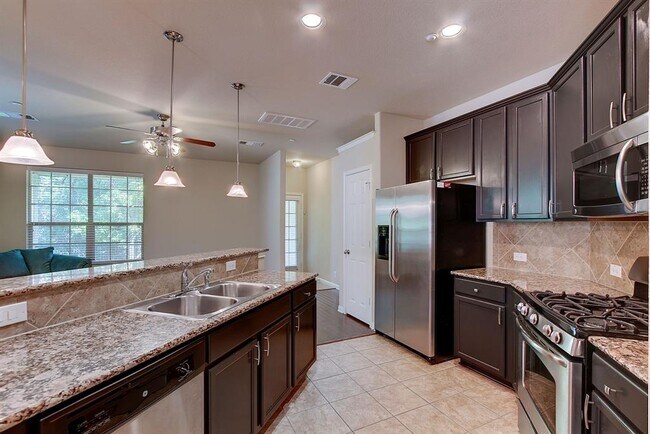 Building Photo - 1310 W Parmer Ln