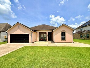 Building Photo - Beautiful 4BR Home with Scenic Lake View Backyard
