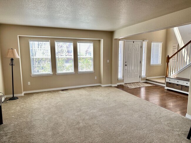 Building Photo - Elegant & Spacious 4BD Home with 3-Car Gar...