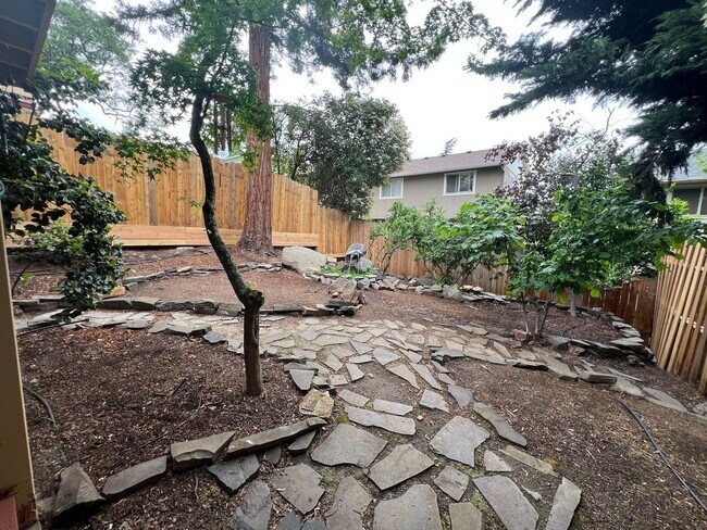 Building Photo - Three bedroom, 2.5 bath townhome