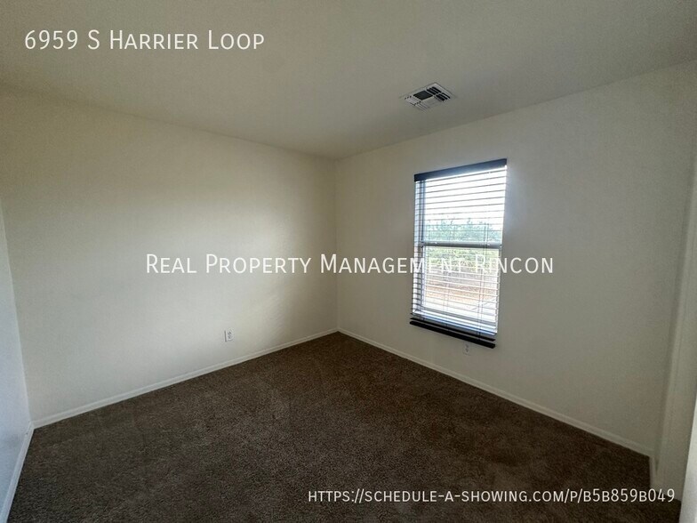 Building Photo - 6959 S Harrier Loop