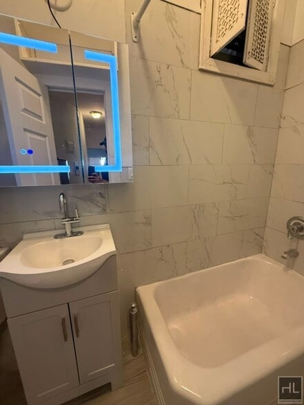 Building Photo - Classic East Village One-Bedroom with Exposed Brick & High Ceilings