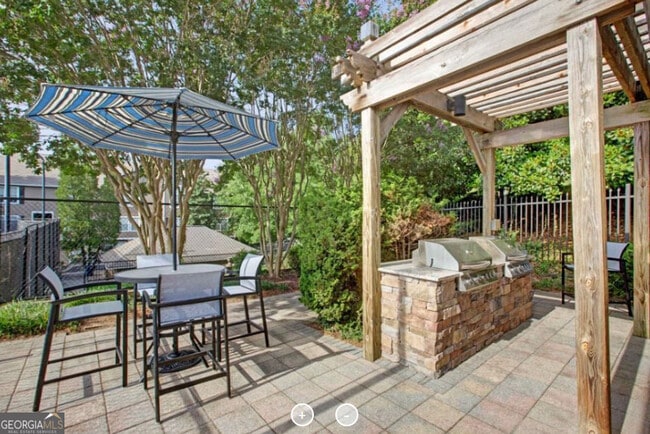 Building Photo - 7150 Peachtree Dunwoody Rd NE