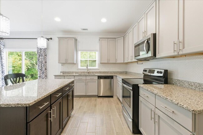 Building Photo - Welcome to Your Ideal Home: Where Luxury a...