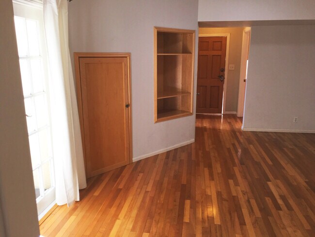 Lower level main room looking at entry - 6123 Scenic Ave