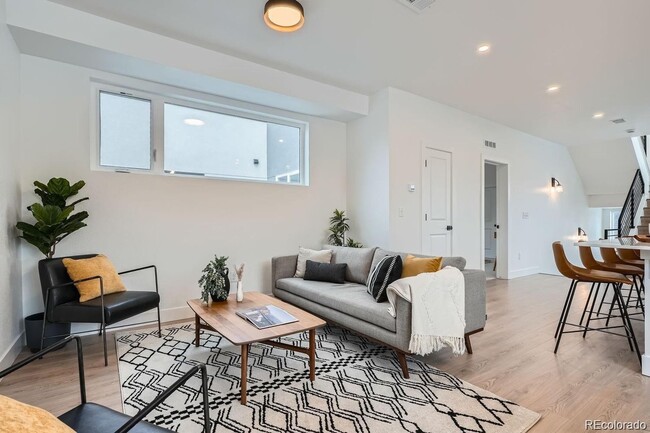 Building Photo - New Construction 3-Bedroom Townhome with Rooftop Deck & Mountain Views