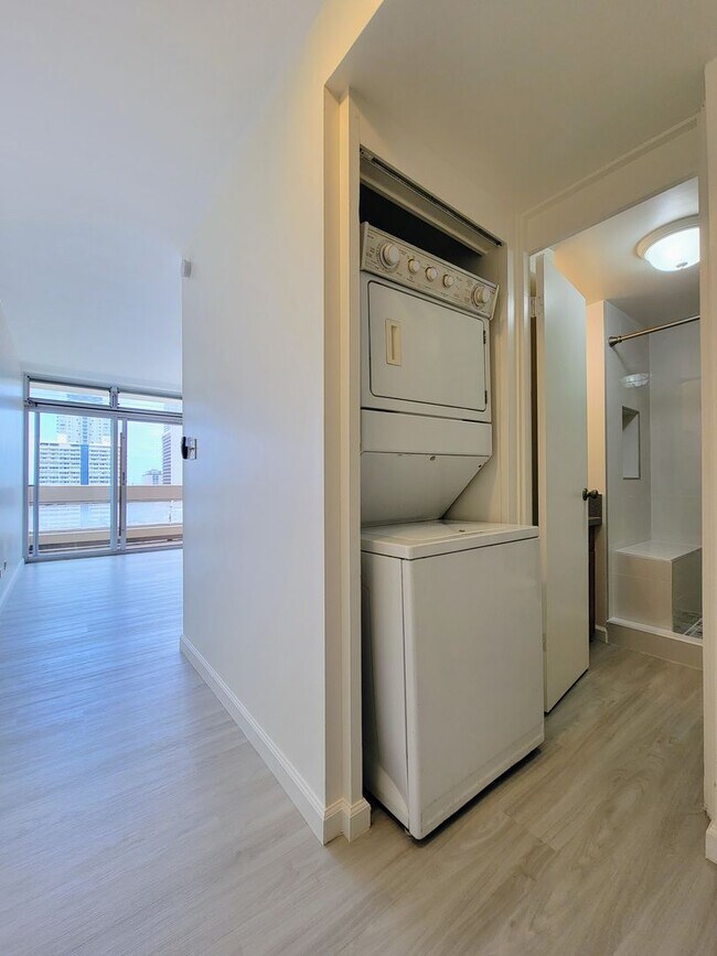 Building Photo - Available Now: A 1 Bedroom, 1 Bathroom Condo with 1 Assigned Parking Stall