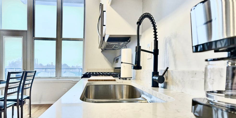 Kitchen sink (coffee maker not shown in earlier photo on right) - 6 S Laflin St