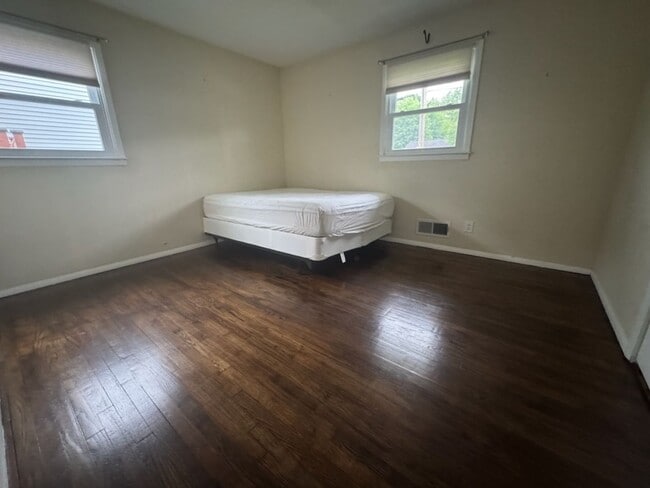 Building Photo - Sunny, Modern Mid-Century Cape 4 BR Spacio...