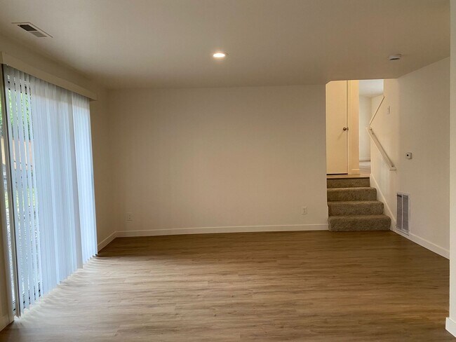 Building Photo - Stylishly Renovated Home with Private Back...