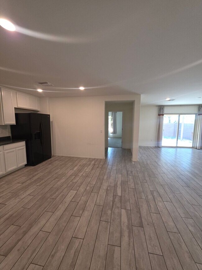 Building Photo - COMING SOON! New 3BR 2 BA Home w/ 2-Car Garage • Stainless Kitchen • Timer-Irrigated Yard in East...