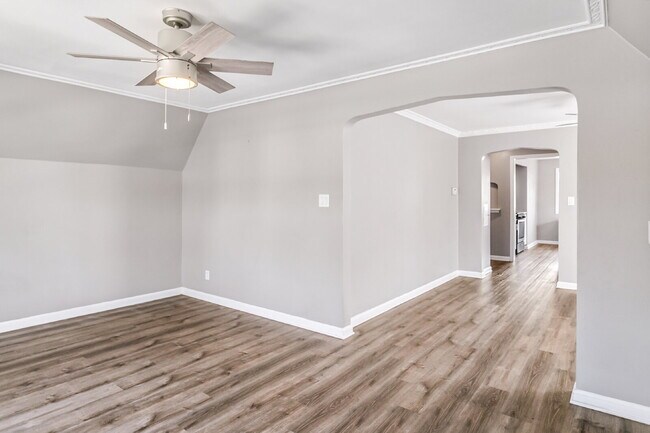 Building Photo - This spacious upper unit features 2 comfortable bedrooms with carpeting