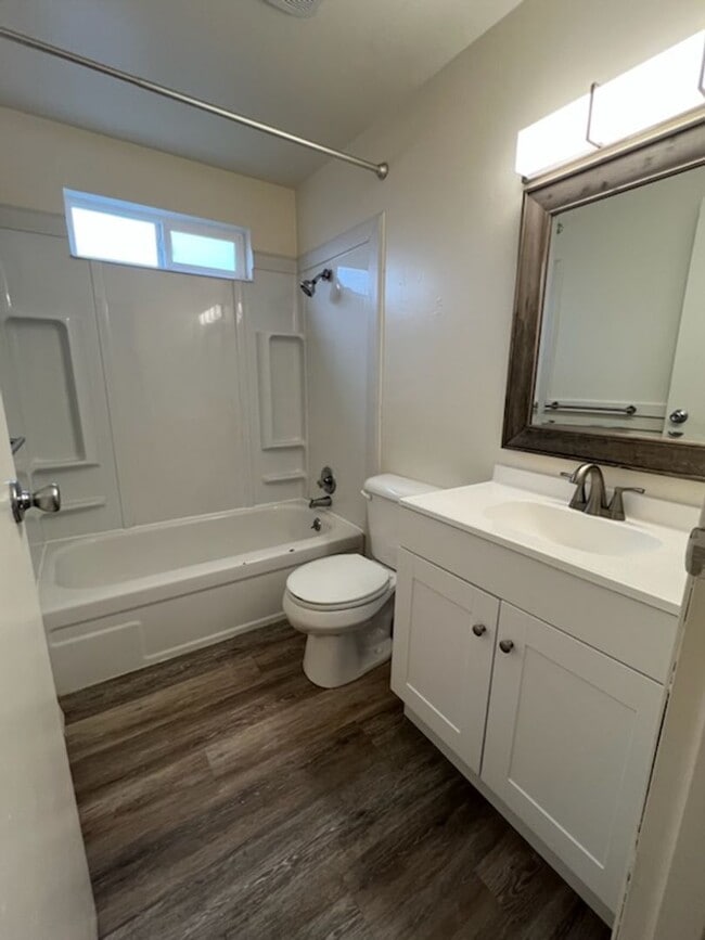 Building Photo - Spacious duplex! Carport, a/c, WASHER & DR...