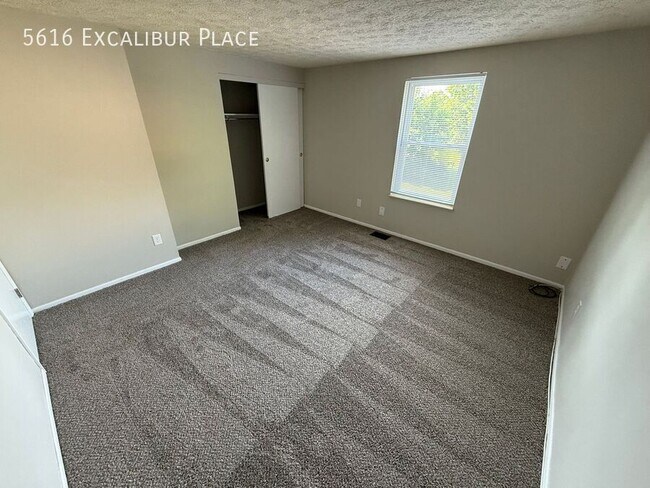 Building Photo - 5616 Excalibur Pl