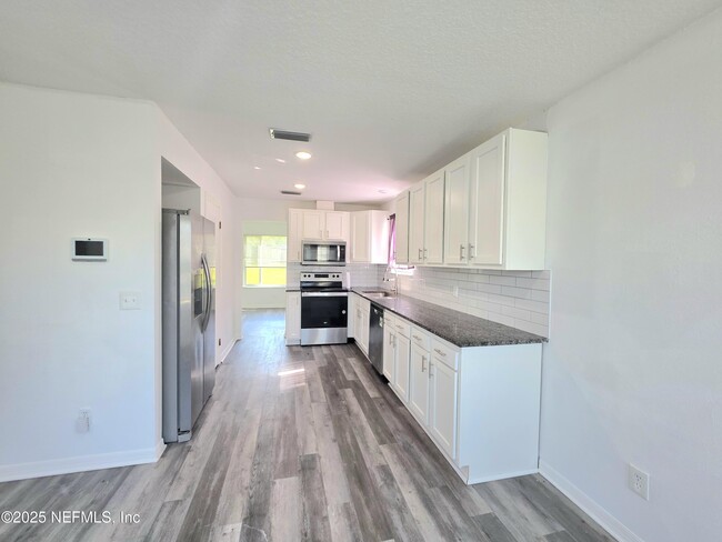Building Photo - 6753 Newgate Cir E