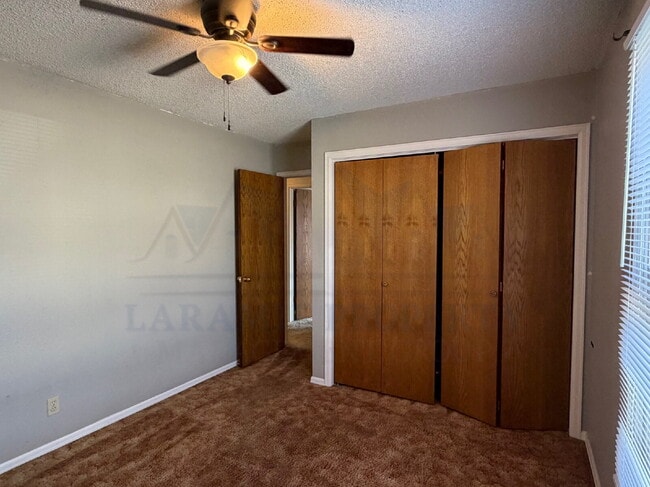 Building Photo - Single-Level 3-Bedroom Townhome with Primary Suite & Attached Garage
