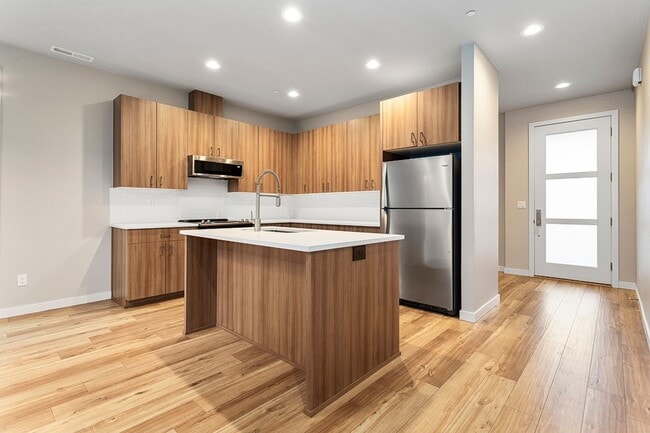 Building Photo - 2022 Build -Almost Brand New 3 br 2.5 bth Home with hardwoods, fenced yard and backs to greenspace !