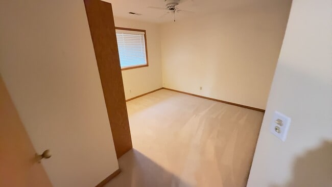 Building Photo - 4bd/3ba HUGE Home w/Hardwood Floors, Russian Fireplace, 2-Car Garage & Fenced Back Yard!