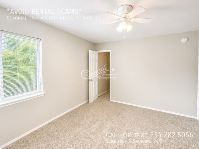 Building Photo - 5406 Boot Scootin Ct