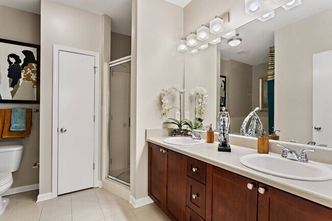 Garden tubs or showers with double-vanity sinks* - AMLI Lindbergh