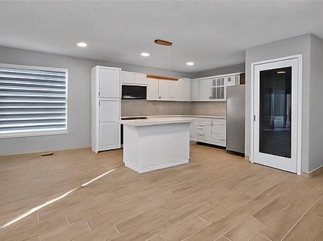 Building Photo - 6385 86th Pl