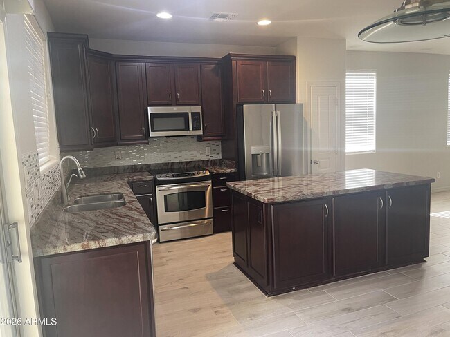 Building Photo - 3934 E Battala Ave