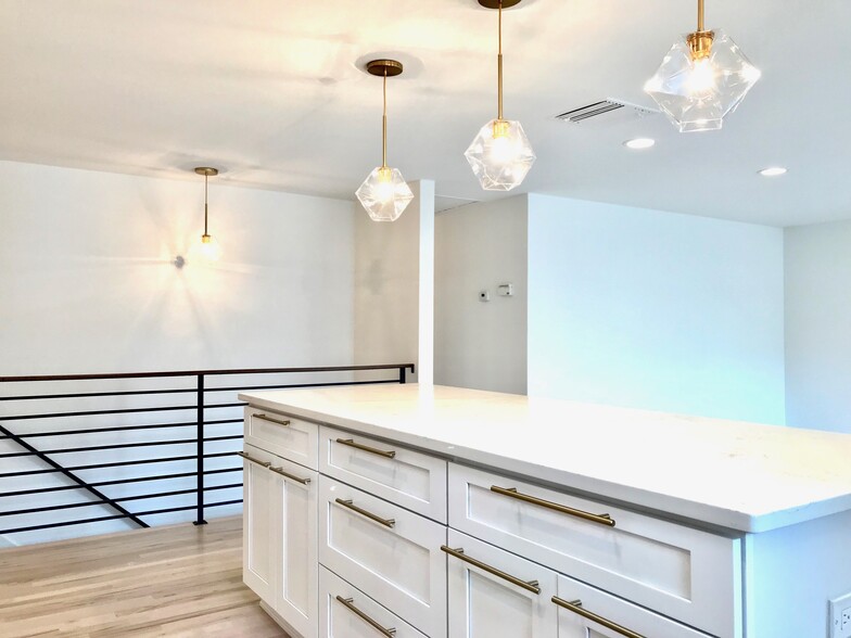 Kitchen Island, Steel and Walnut Stair Rail, West Elm Brushed Gold Light Fixtures - 3360 ward road