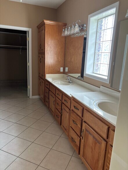 Master bath, double vanity and storage with closet - 5225 E Dee Woods Rd