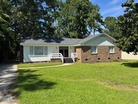 Building Photo - Spacious Rooms, Deck and Detached Garage / Shop