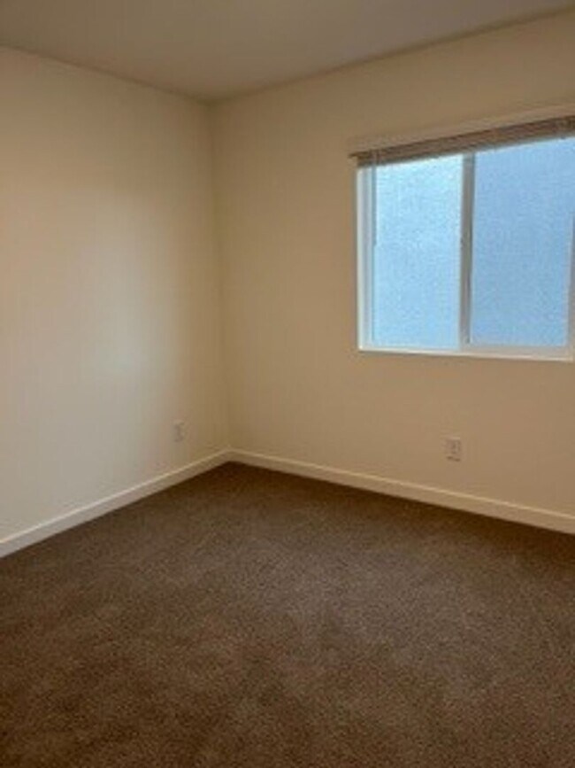 Building Photo - Brand new four bedroom, two and one half b...