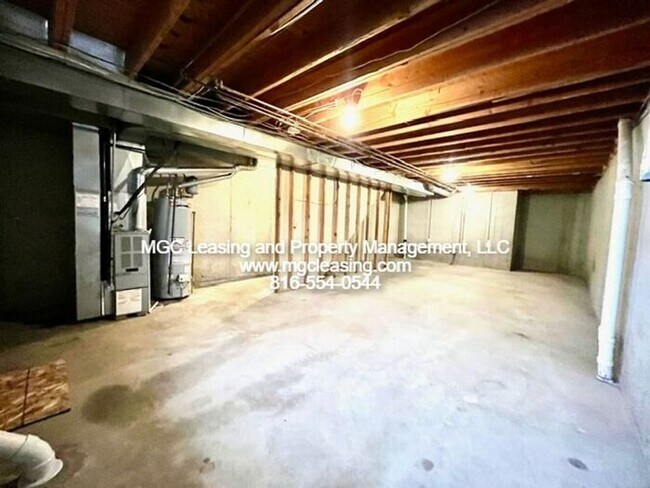 Building Photo - Spacious Raymore Townhome in Prime Remington Village Location