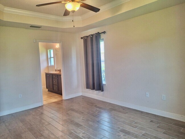 Building Photo - Spacious 4-Bedroom Brick Home in Preserve ...